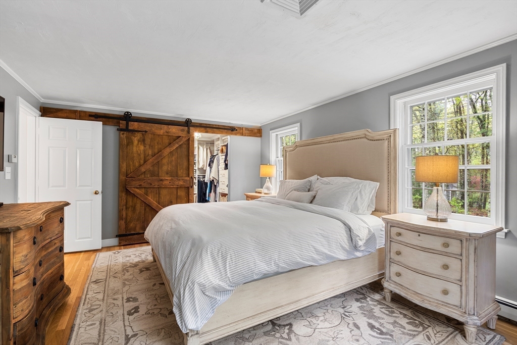 58 High Ridge Road Boxford, MA 01921 - Photo 27 of 40 a bedroom with a bed and a window