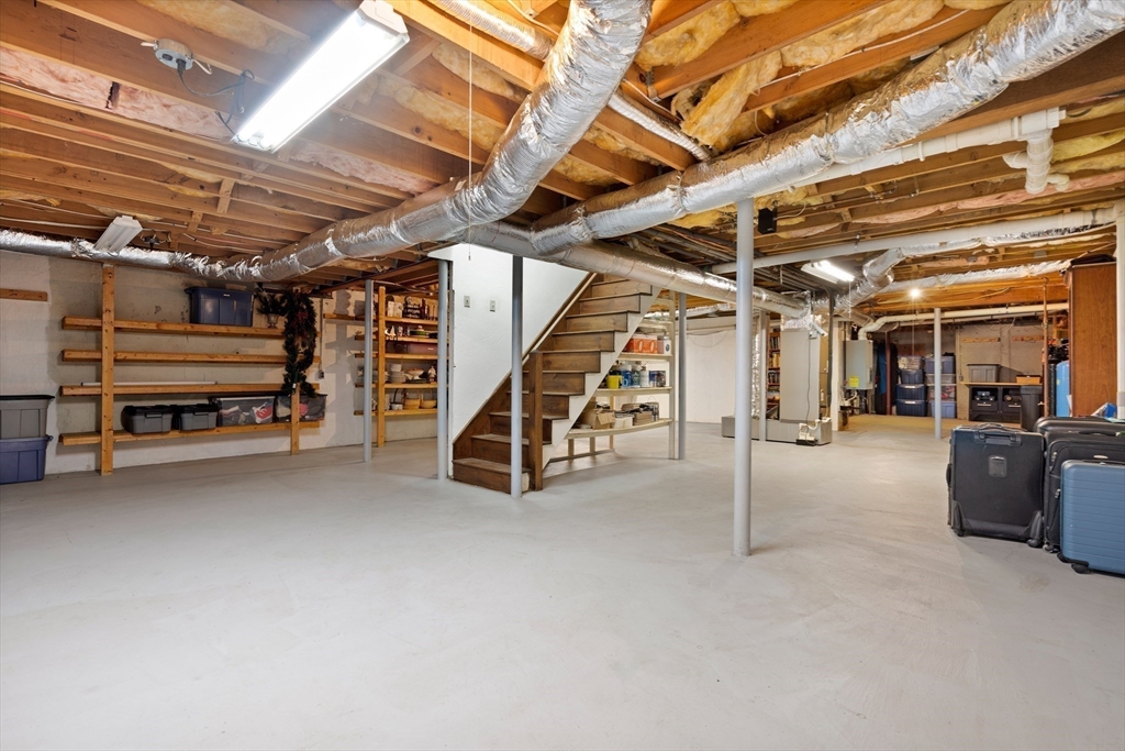 58 High Ridge Road Boxford, MA 01921 - Photo 40 of 40 a view of an empty room with wooden ceiling