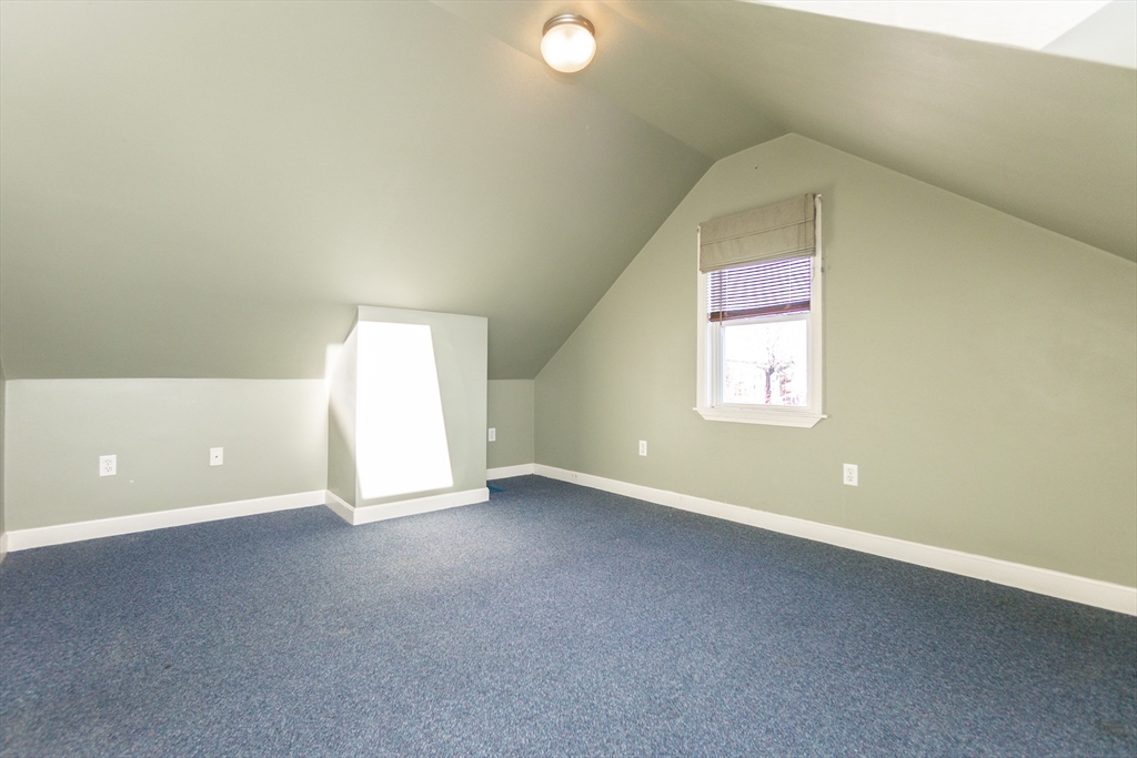 86 Flint Street Salem, MA 01970 - Photo 24 of 30 a view of an empty room with a window