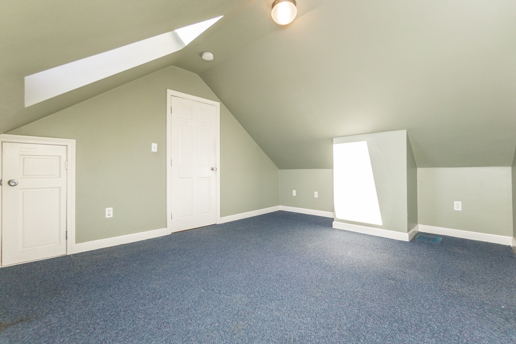 86 Flint Street Salem, MA 01970 - Photo 25 of 30 a view of an empty room with a window