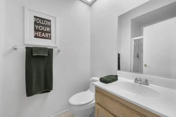 a view of a house with a potted plant