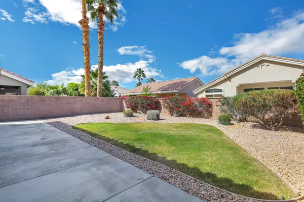 a view of a table and chairs with an outdoor space