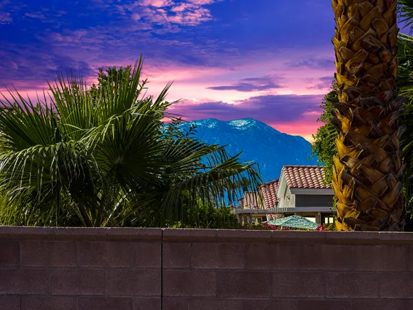 a view of a golf course with a lake view