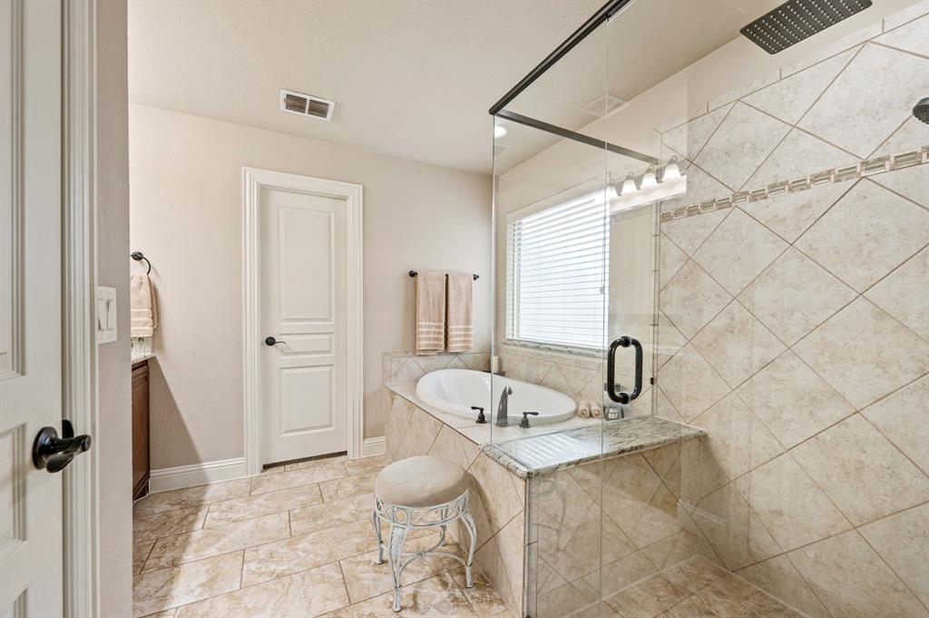 5209 Edgebrook Way Fort Worth, TX 76244 - Photo 16 of 33 a bathroom with a sink and a shower