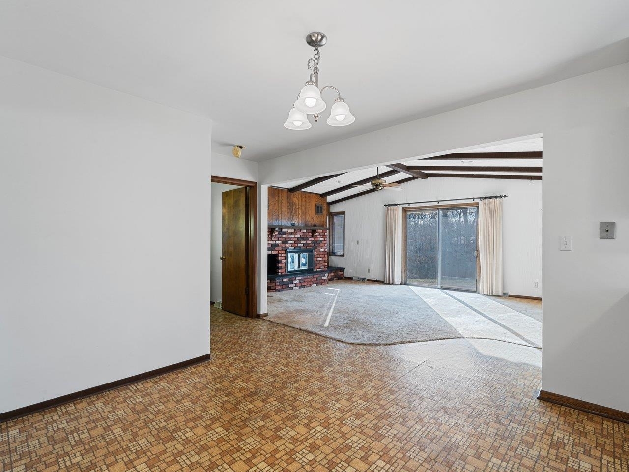 3602 14th Avenue Moline, IL 61265 - Photo 23 of 36 a view of a livingroom with furniture and chandelier