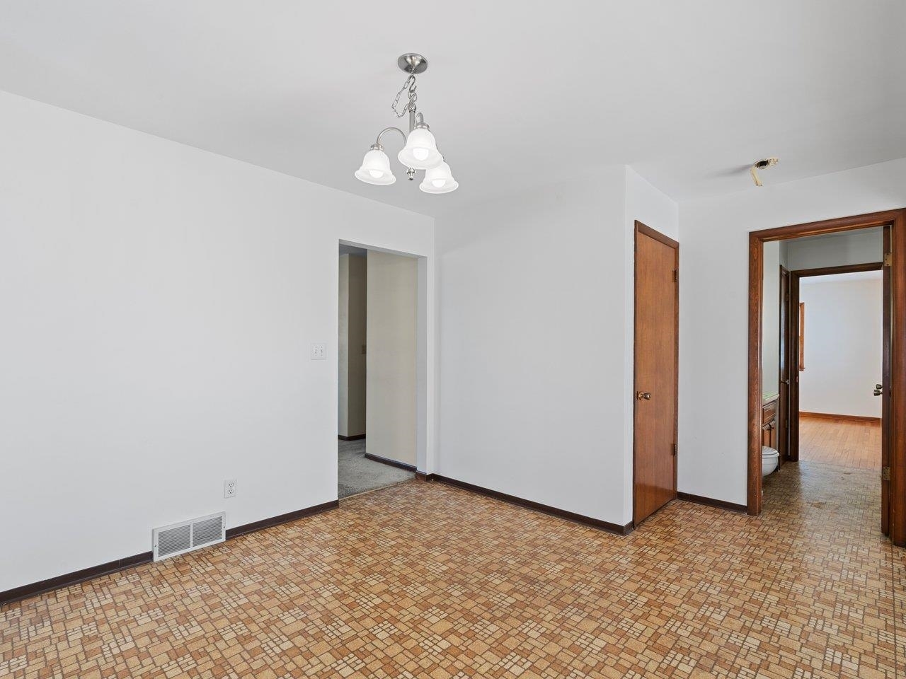 3602 14th Avenue Moline, IL 61265 - Photo 24 of 36 an empty room with chandelier fan