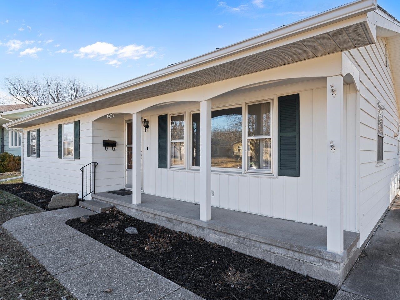 3602 14th Avenue Moline, IL 61265 - Photo 3 of 36 a front view of a house with garden