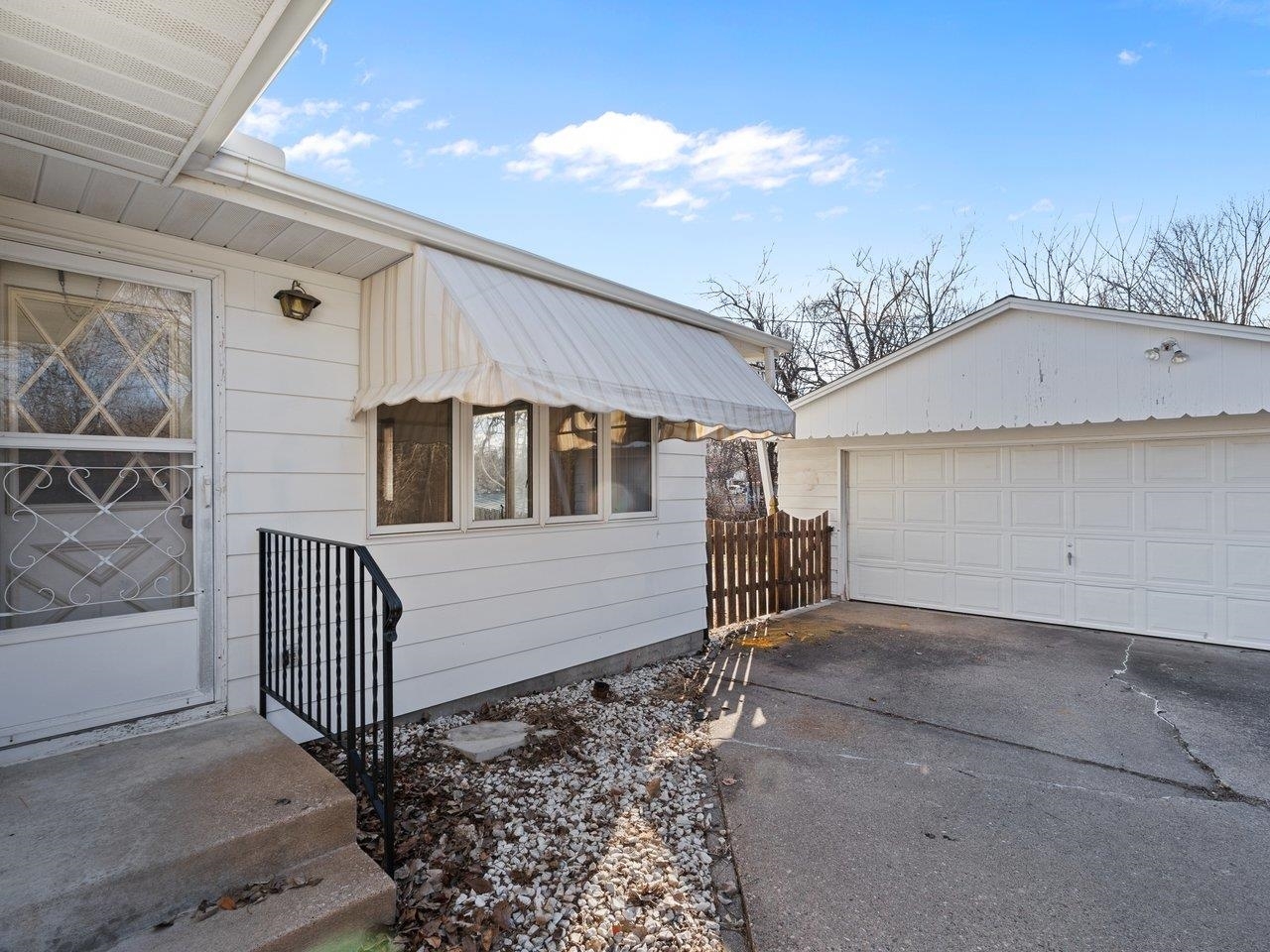 3602 14th Avenue Moline, IL 61265 - Photo 5 of 36 a view of a house with a fence