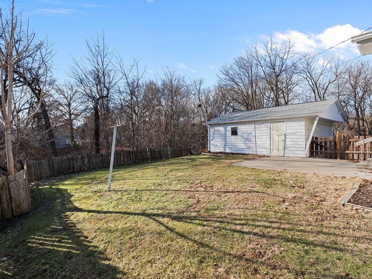 3602 14th Avenue Moline, IL 61265 - Photo 7 of 36 a backyard of a house