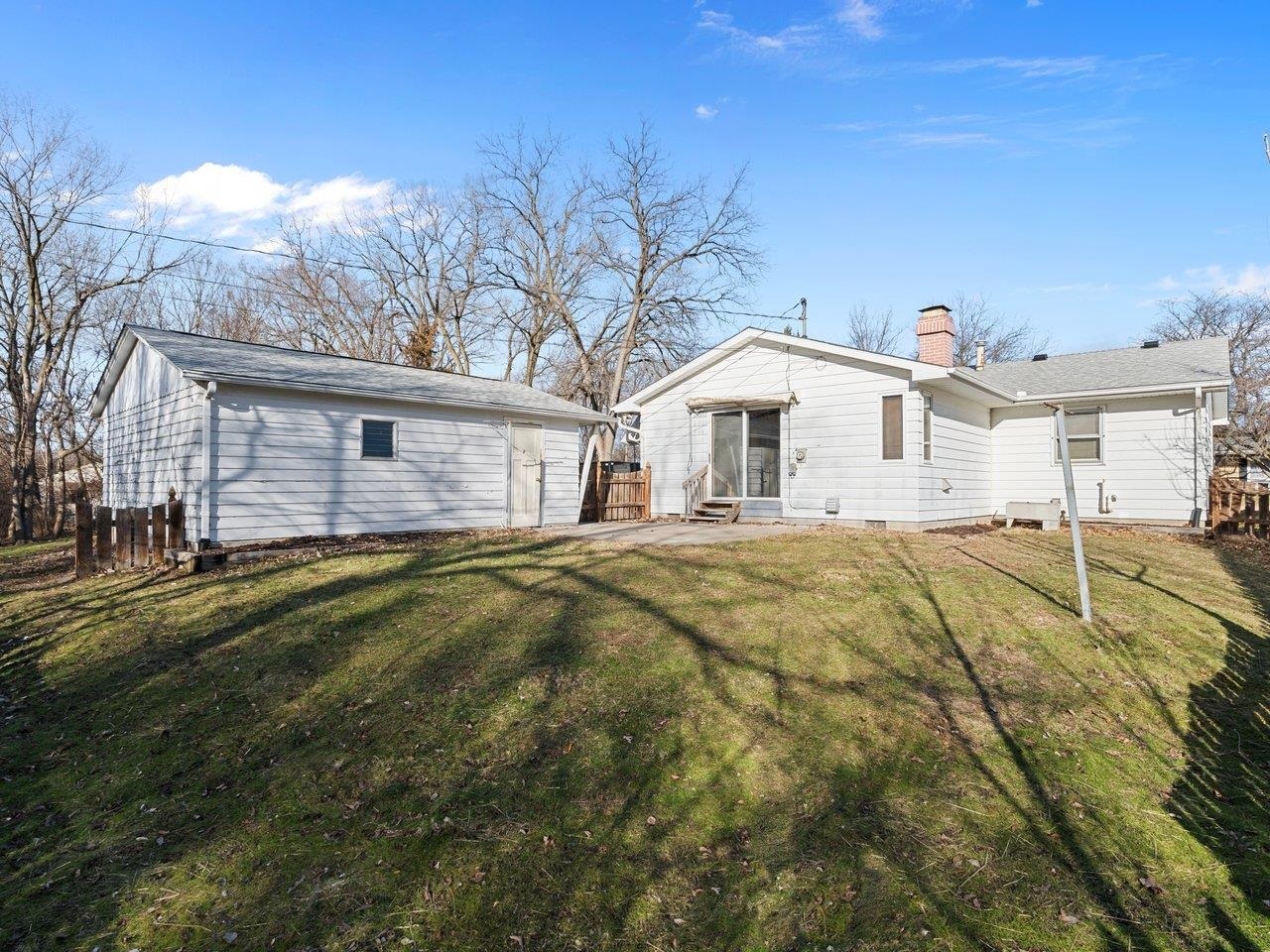 3602 14th Avenue Moline, IL 61265 - Photo 8 of 36 a front view of a house with a yard