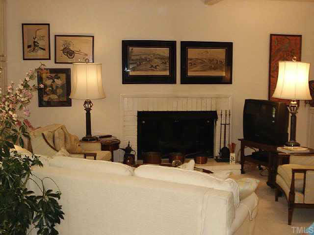 1786 Quail Ridge Road Raleigh, NC 27609 - Photo 6 of 10 GREAT ROOM IS 21X14 FEATURING BRICK GAS LOG FIREPLACE,WALL OF WINDOWS TO PATIO,CUSTOM BUILTIN CABINETS AND SHELVING*YOU'LL FEEL RIGHT AT HOME* Other
