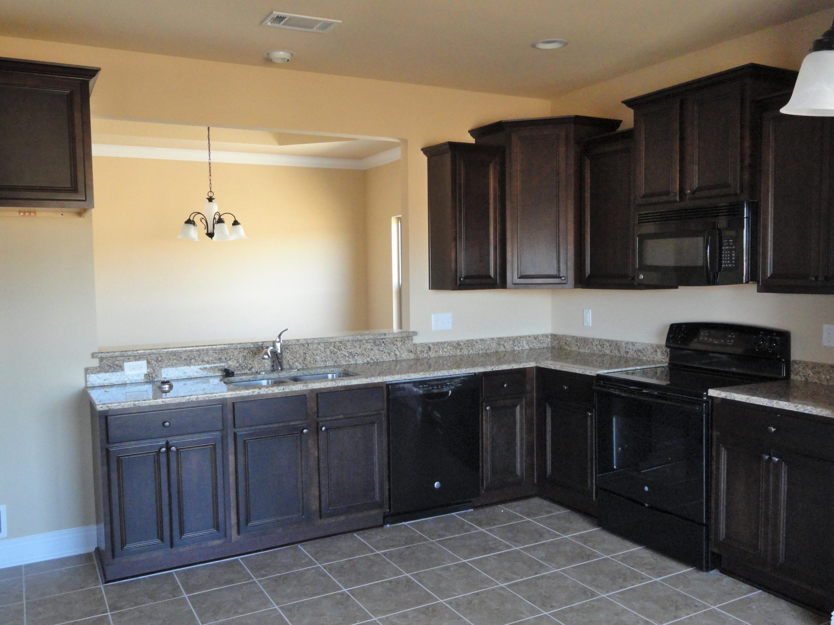 3443 Brownstone Road Crestview, FL 32539 - Photo 5 of 6 a kitchen with a sink and a stove