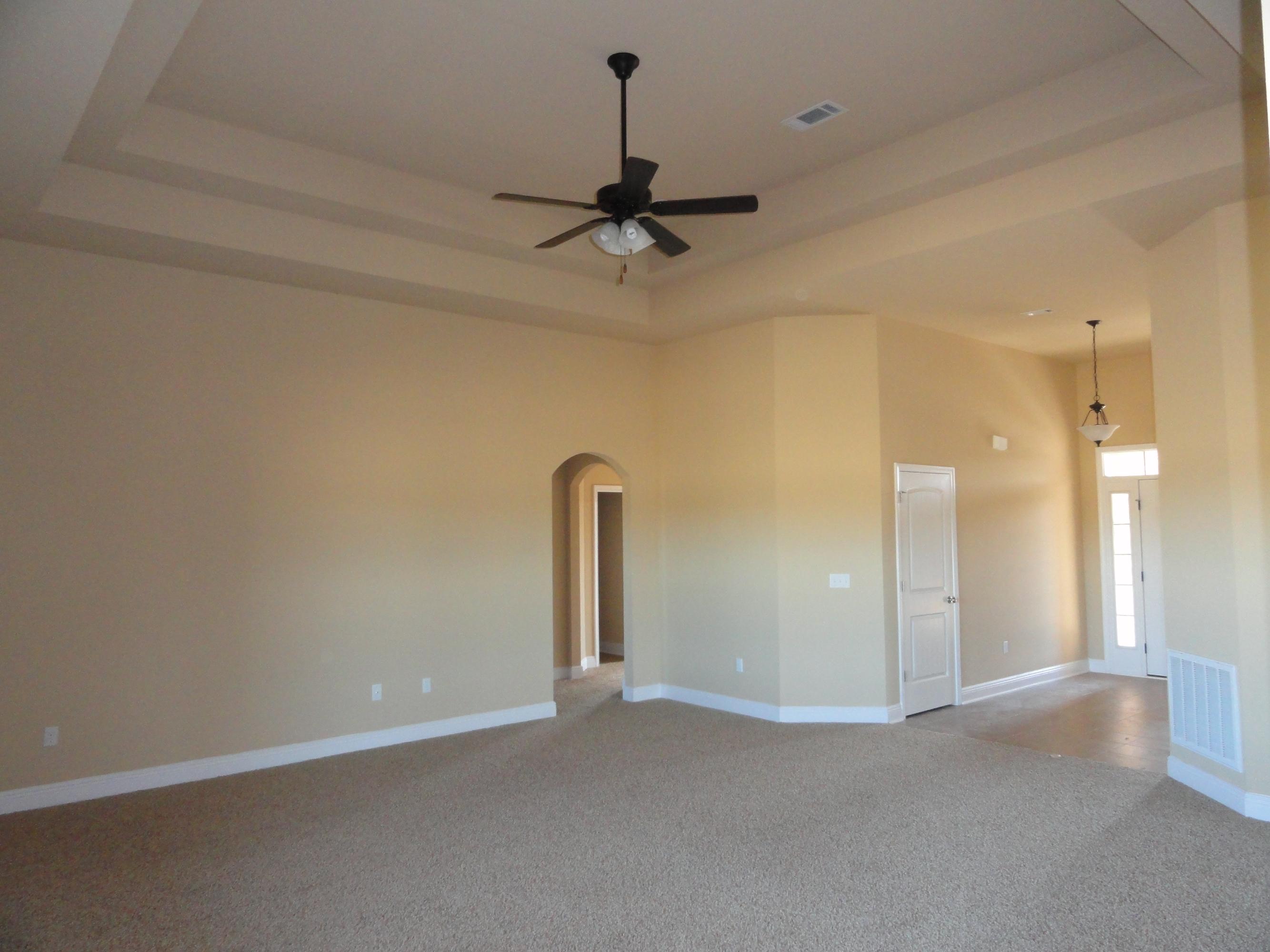 3443 Brownstone Road Crestview, FL 32539 - Photo 6 of 6 a view of a hallway with a chandelier fan