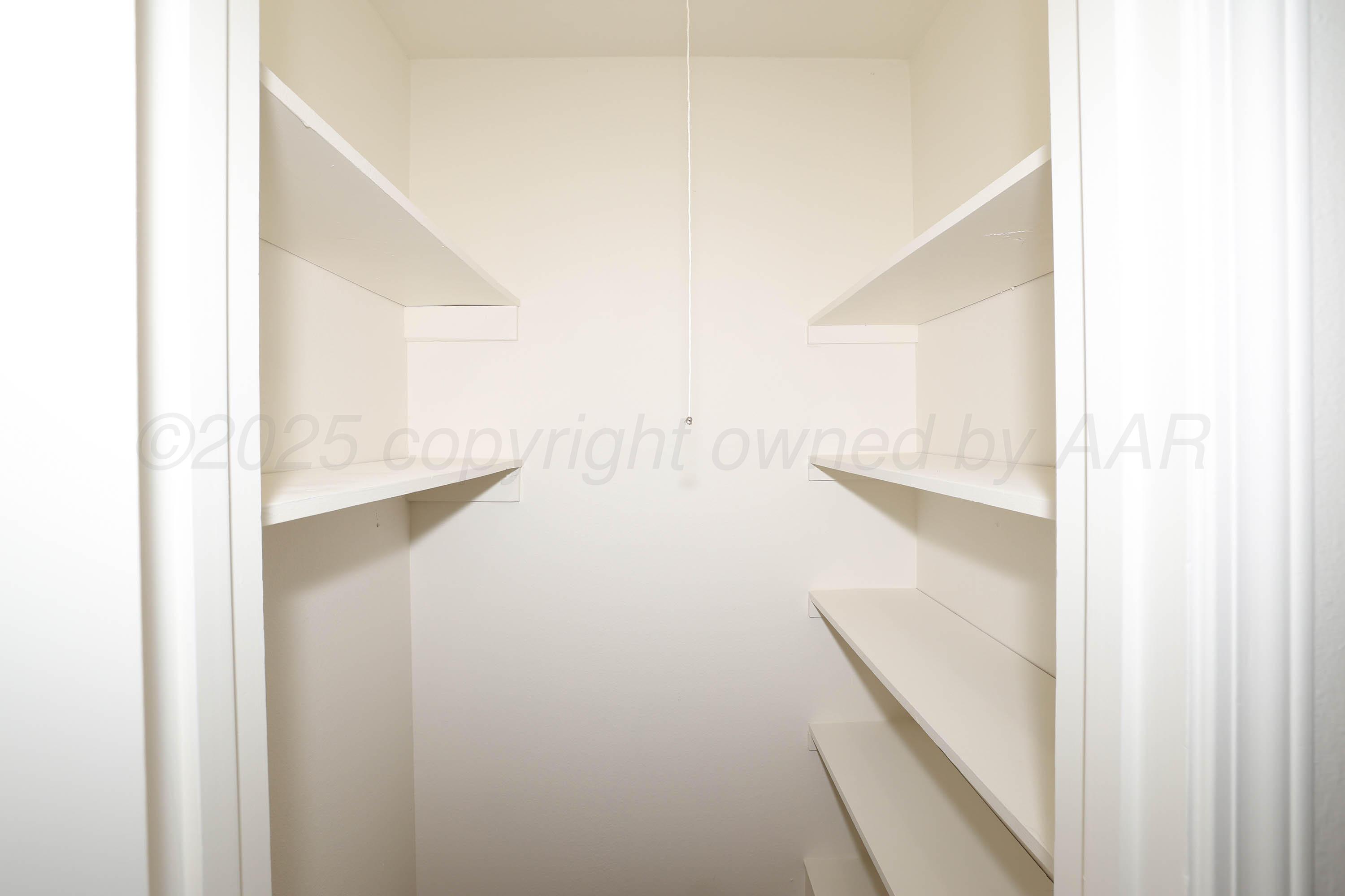 4415 Kingston Road Amarillo, TX 79109 - Photo 24 of 26 a view of walk in closet