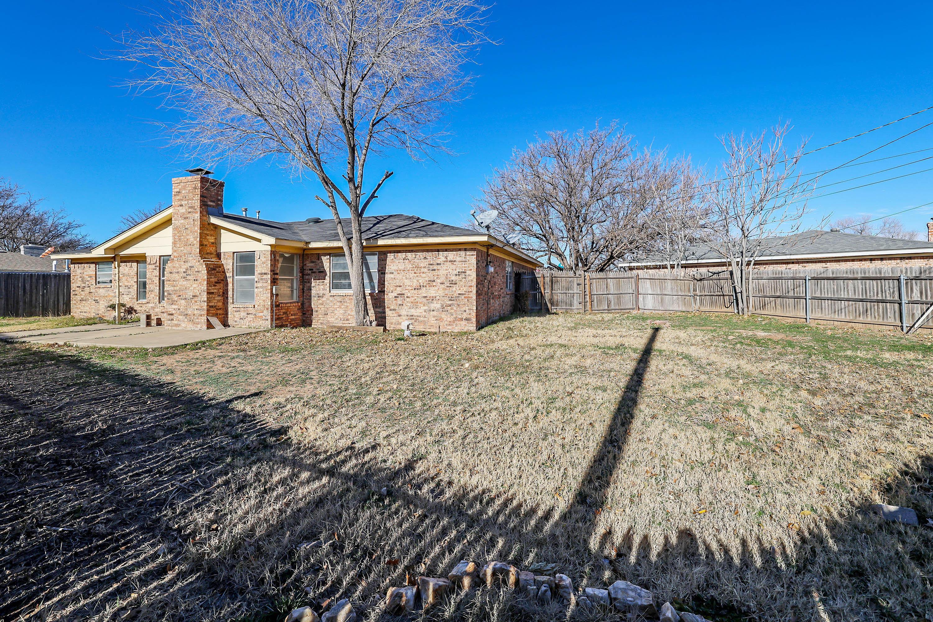 4415 Kingston Road Amarillo, TX 79109 - Photo 26 of 26 a view of a house with a yard