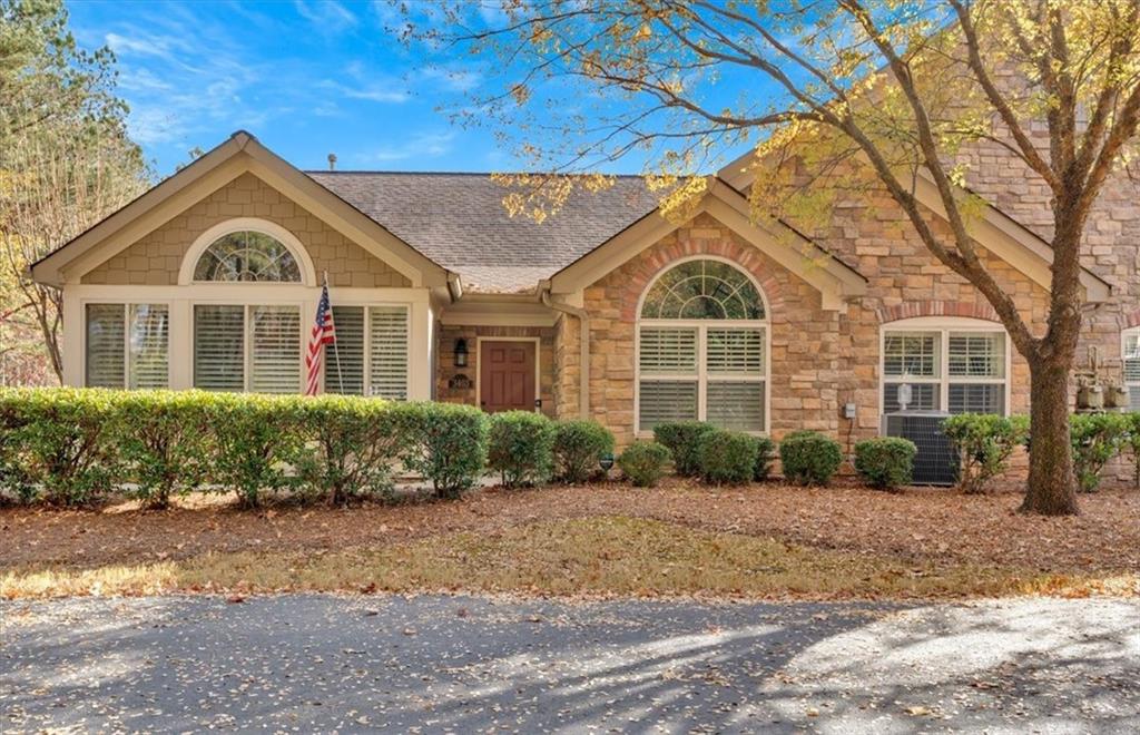 3403 Old Due West Road Northwest, Unit 6 Marietta, GA 30064 - Photo 1 of 1 a front view of a house with a yard