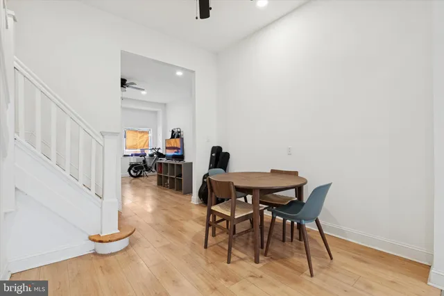 a view of a livingroom with furniture and a way to kitchen