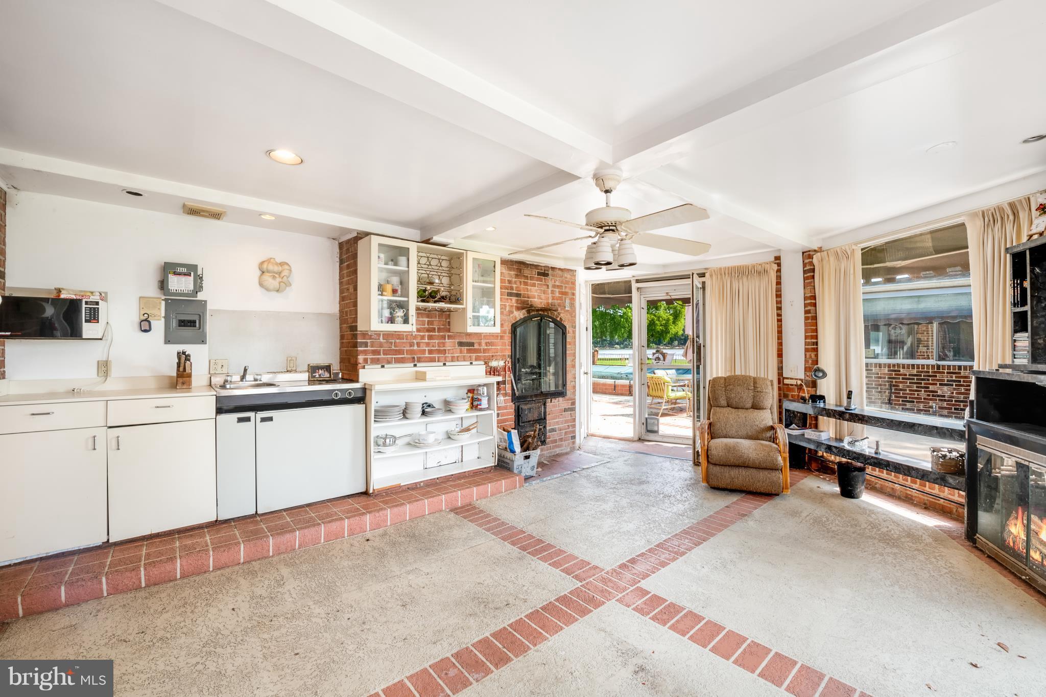 1745 Grandview Road Pasadena, MD 21122 - Photo 22 of 28 Lower level kitchen just steps from the pool