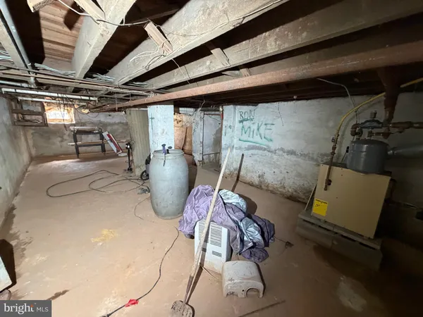 a view of a storage room with racks on the wall