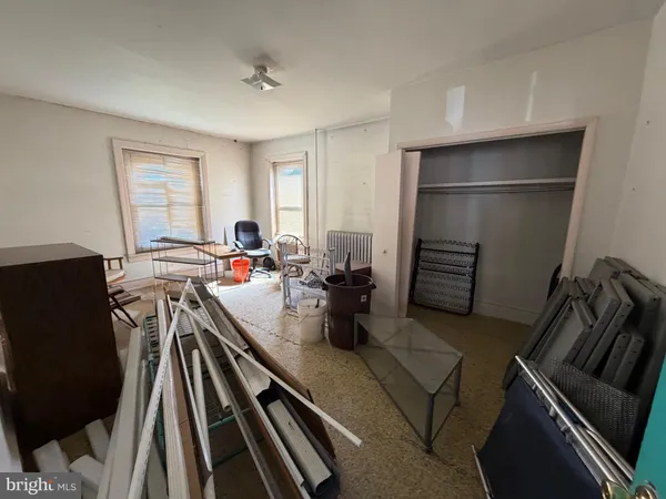a view of a living room and dining room
