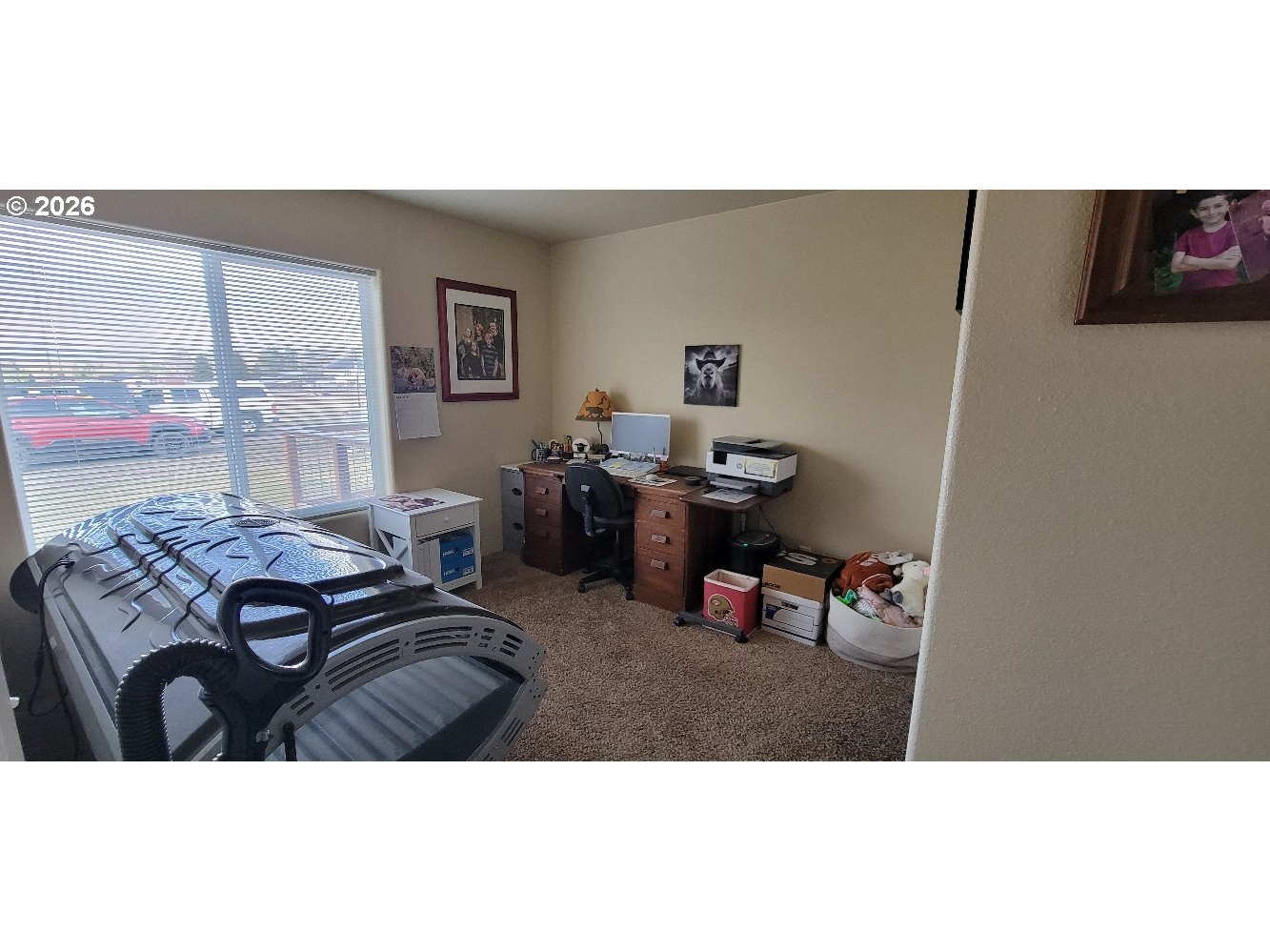 70724 Bear Creek Road Wallowa, OR 97885 - Photo 12 of 44 a bedroom with furniture and a large window
