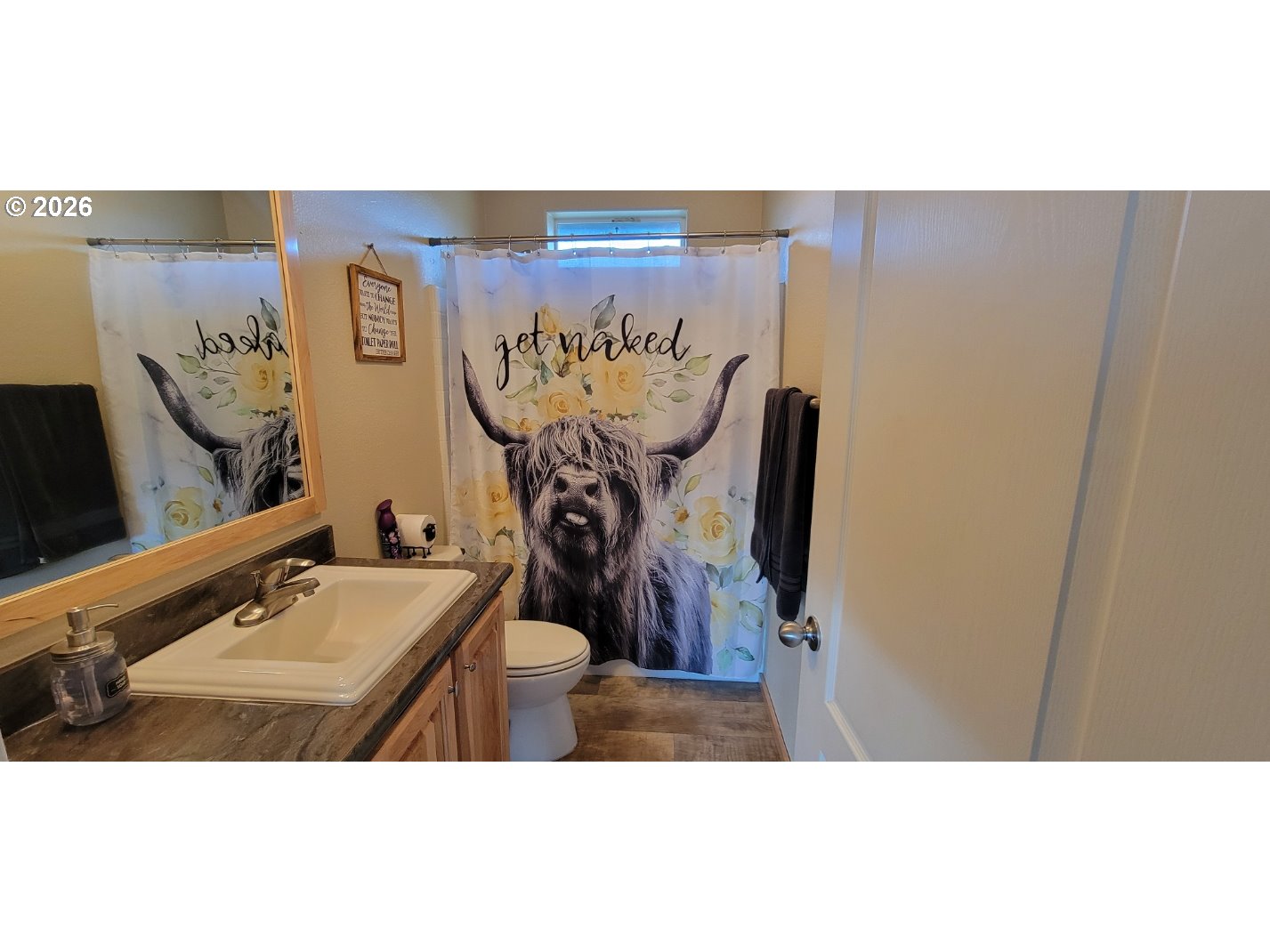 70724 Bear Creek Road Wallowa, OR 97885 - Photo 14 of 44 a bathroom with a sink and mirror