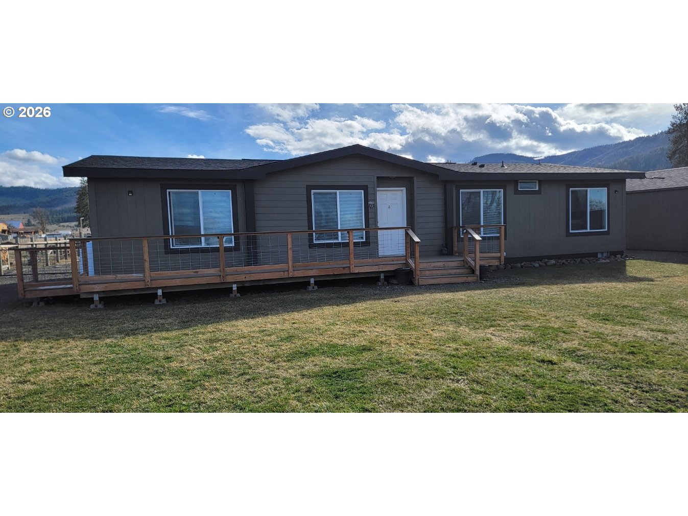 70724 Bear Creek Road Wallowa, OR 97885 - Photo 2 of 44 a house view with a garden space
