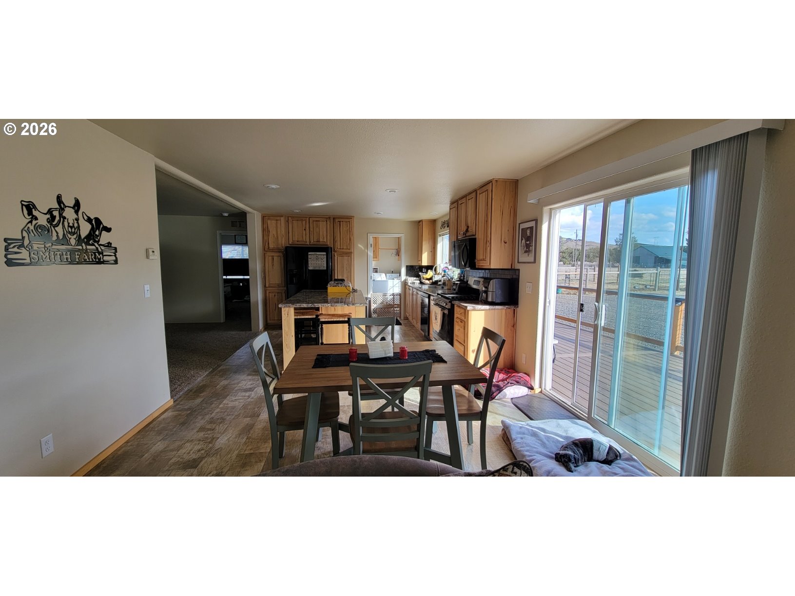 70724 Bear Creek Road Wallowa, OR 97885 - Photo 6 of 44 a view of a dining room with furniture window and outside view