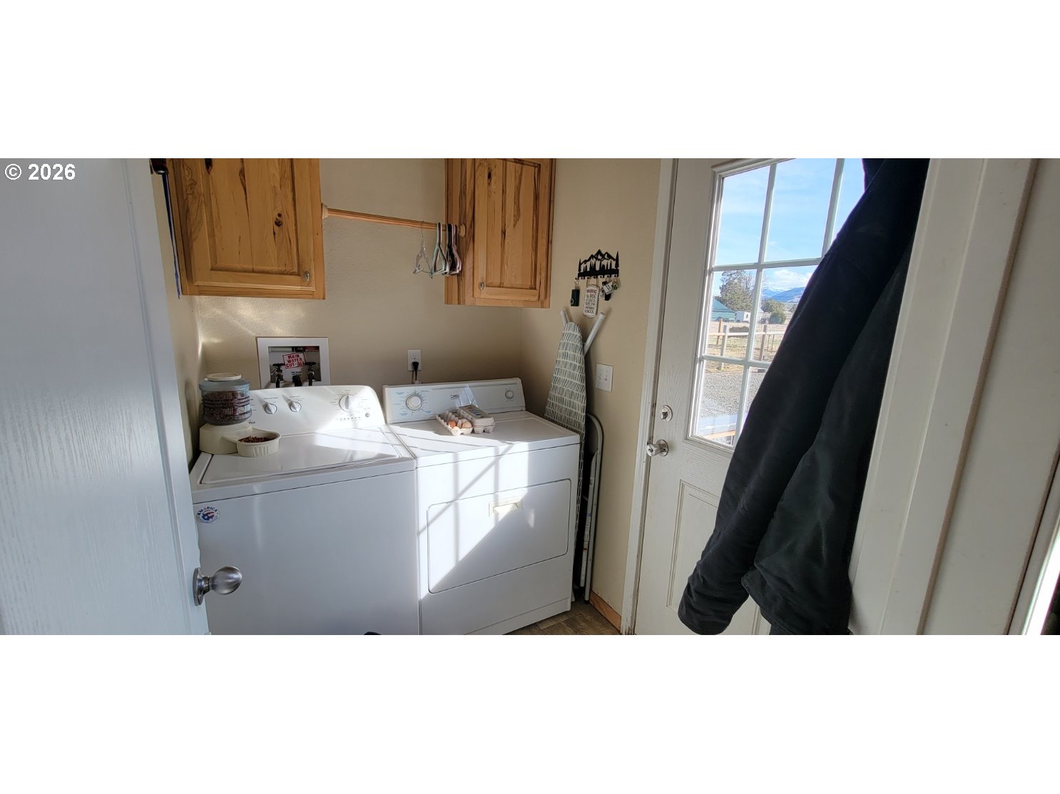 70724 Bear Creek Road Wallowa, OR 97885 - Photo 8 of 44 a kitchen with cabinets and refrigerator