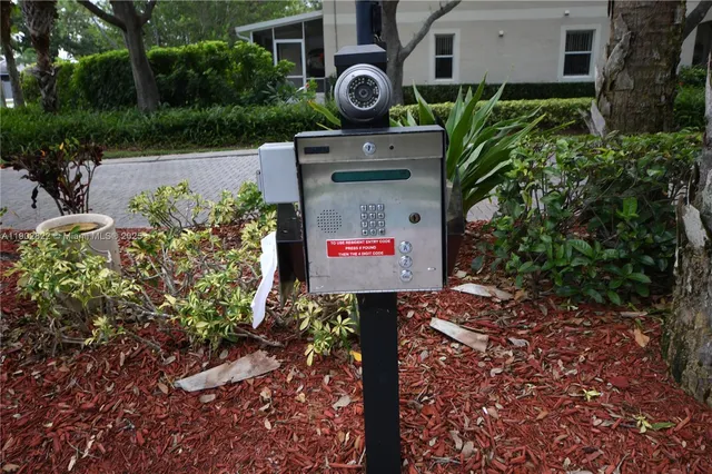 a view of outdoor space with signage and flags