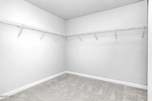 a view of a room with racks on the wall