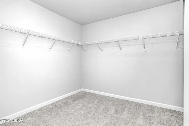 a view of a room with racks on the wall