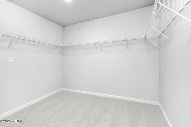 a view of an empty walk in closet