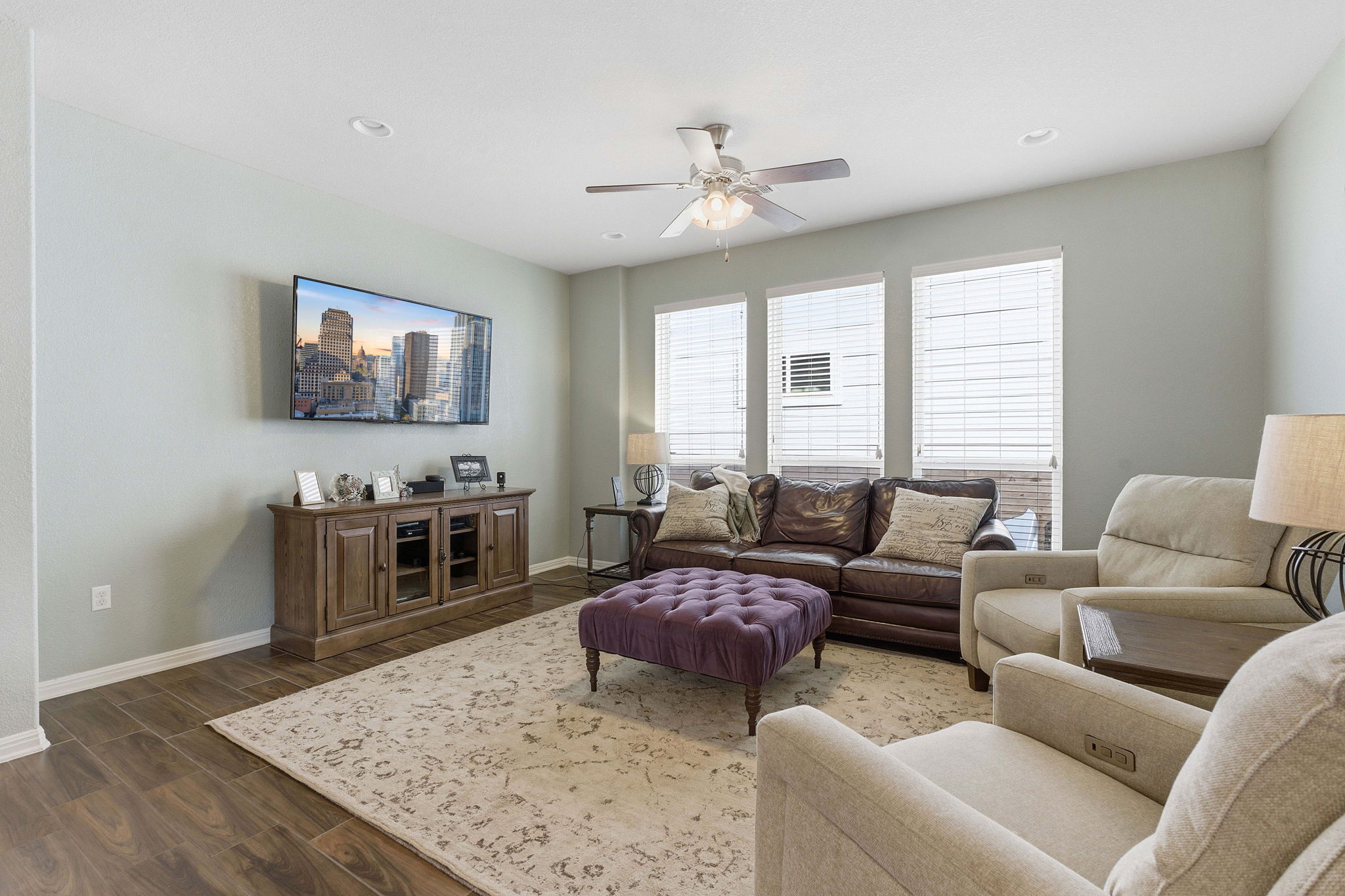 6005 Baythorne Drive Austin, TX 78747 - Photo 13 of 40 Living area with dark wood-style flooring, ceiling fan, and recessed lighting