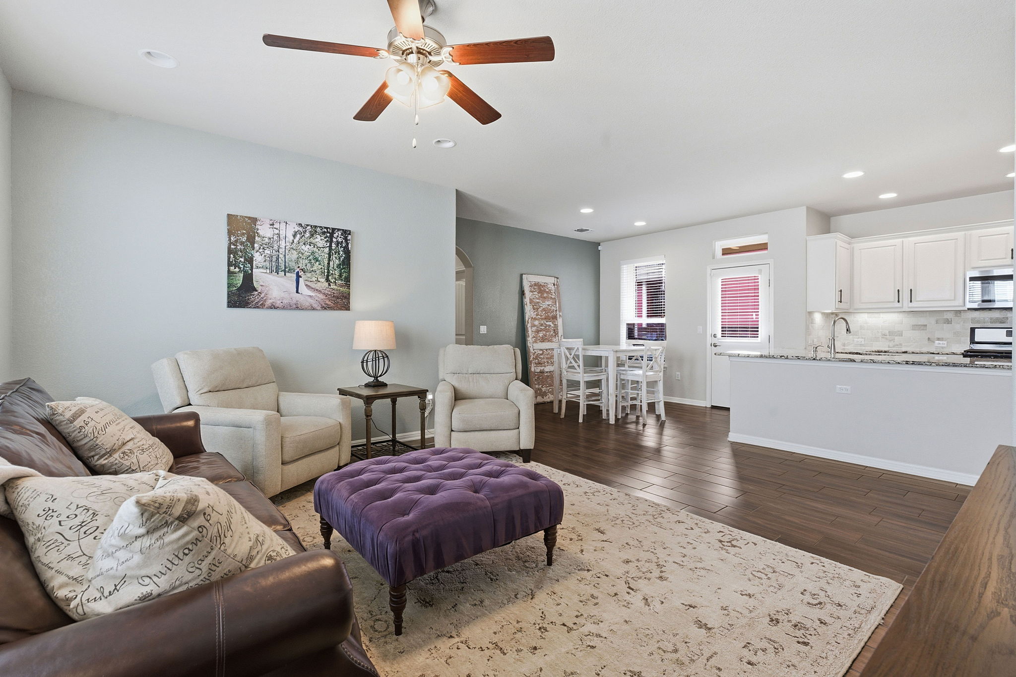 6005 Baythorne Drive Austin, TX 78747 - Photo 14 of 40 Living room featuring dark wood finished floors, recessed lighting, and ceiling fan