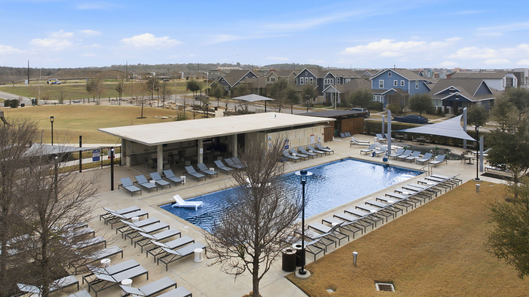 6005 Baythorne Drive Austin, TX 78747 - Photo 30 of 40 Community pool featuring a patio area and a residential view