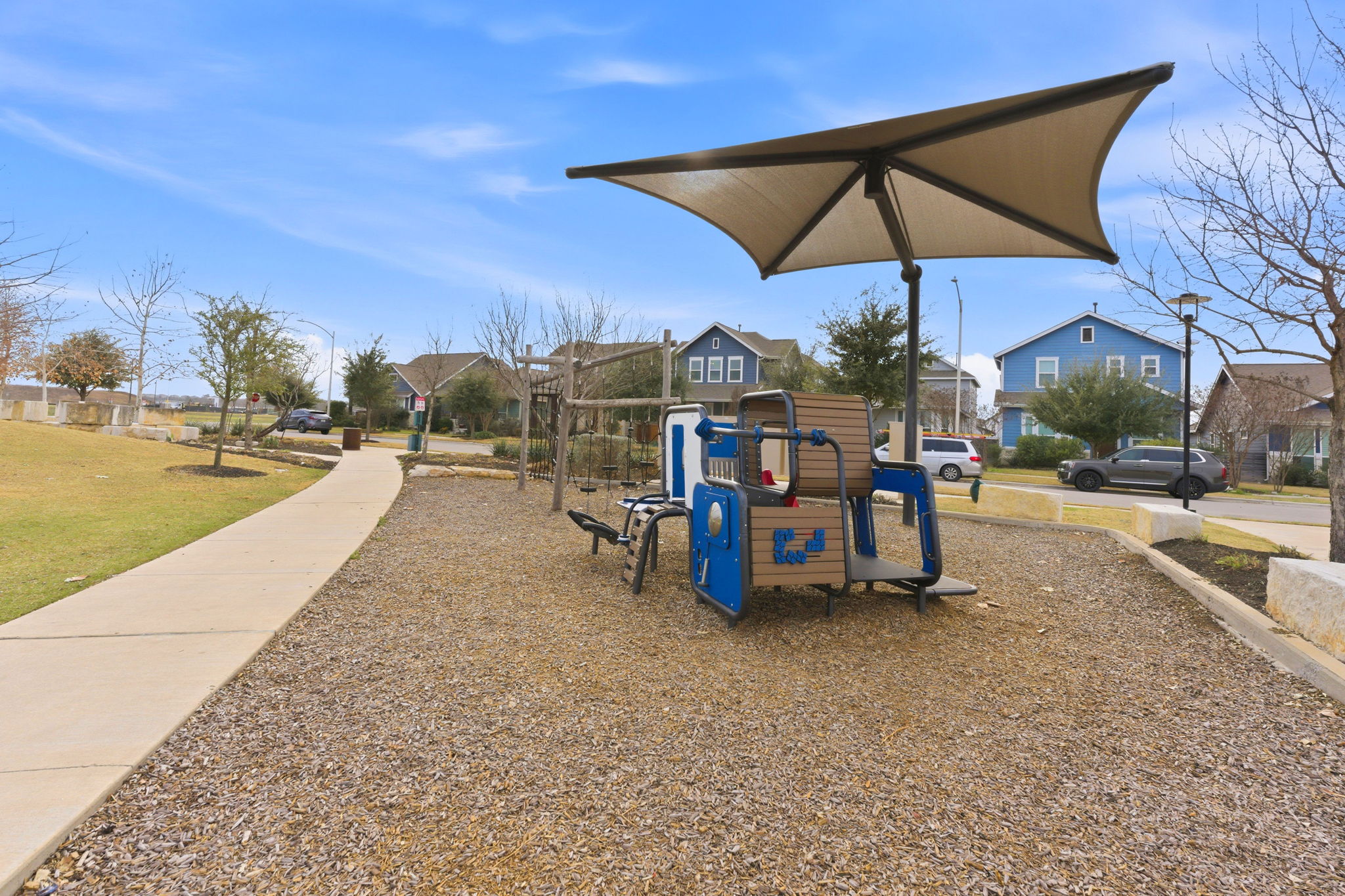6005 Baythorne Drive Austin, TX 78747 - Photo 32 of 40 Community jungle gym with a residential view