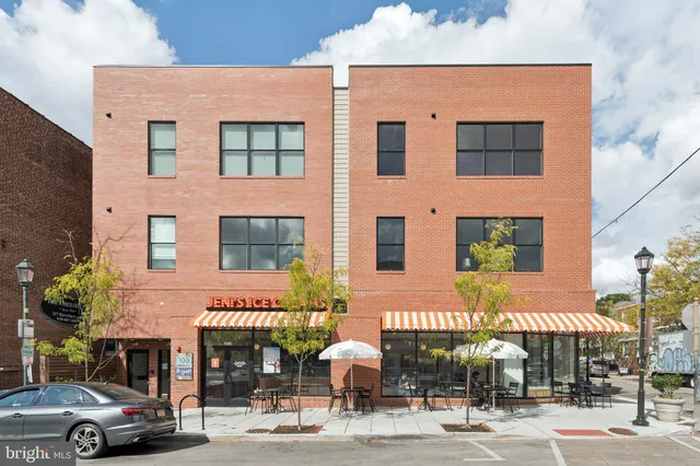 a car parked in front of a building