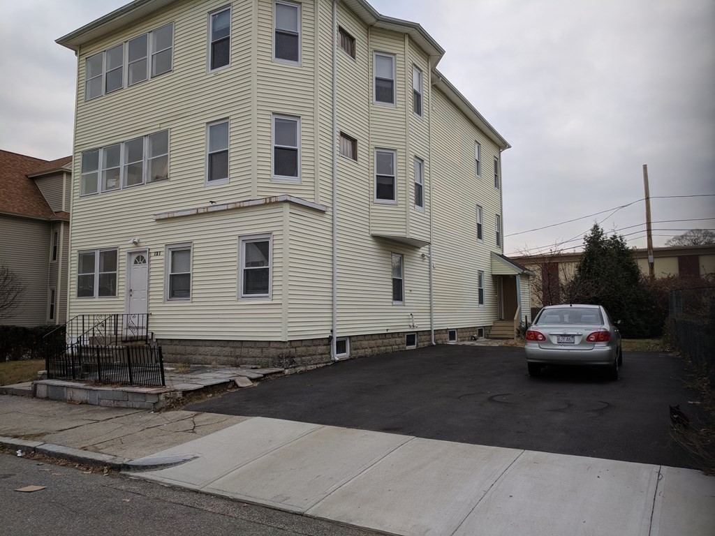 121 Winfield Street Worcester, MA 01602 - Photo 2 of 42 a car parked in front of a house
