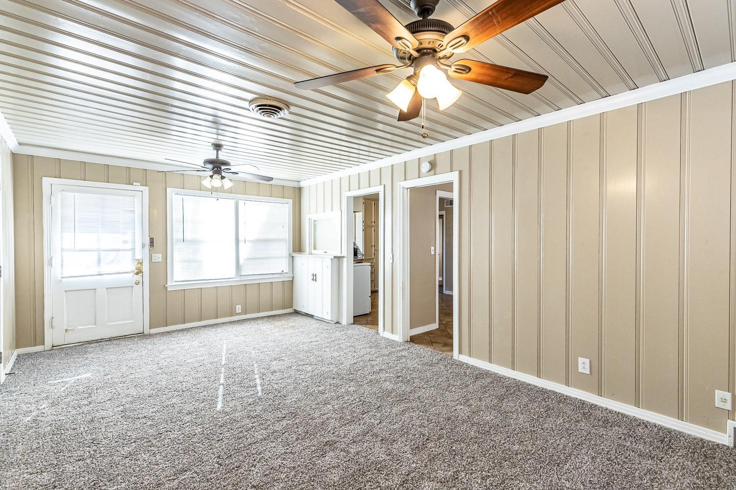 3708 27th Street Lubbock, TX 79410 - Photo 12 of 23 a view of an empty room with a window