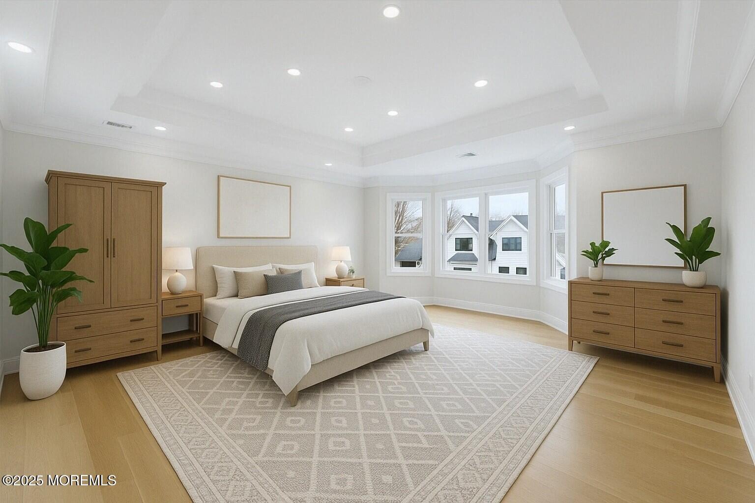 806 Arbor Road Paramus, NJ 07652 - Photo 12 of 29 a spacious bedroom with a large bed and a potted plant