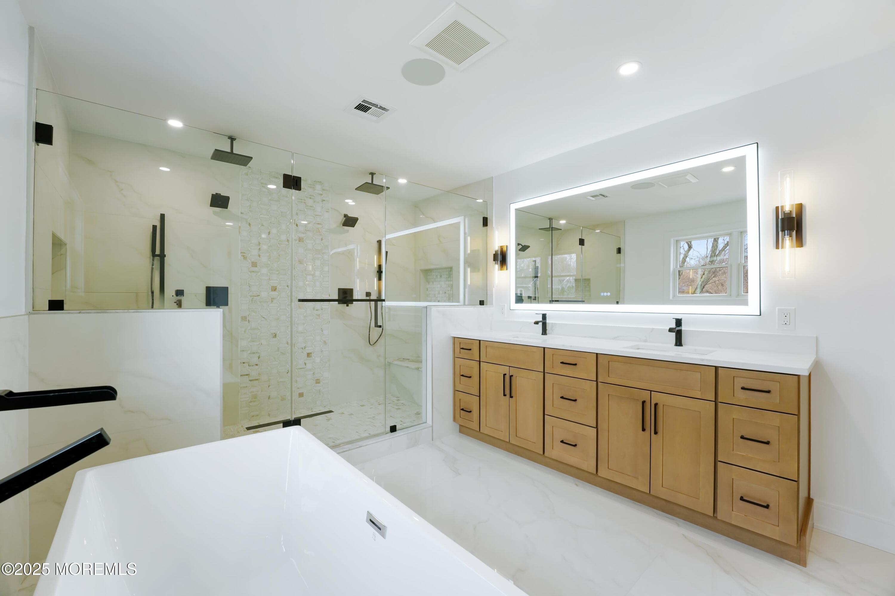 806 Arbor Road Paramus, NJ 07652 - Photo 13 of 29 a spacious bathroom with a double vanity sink mirror and double
