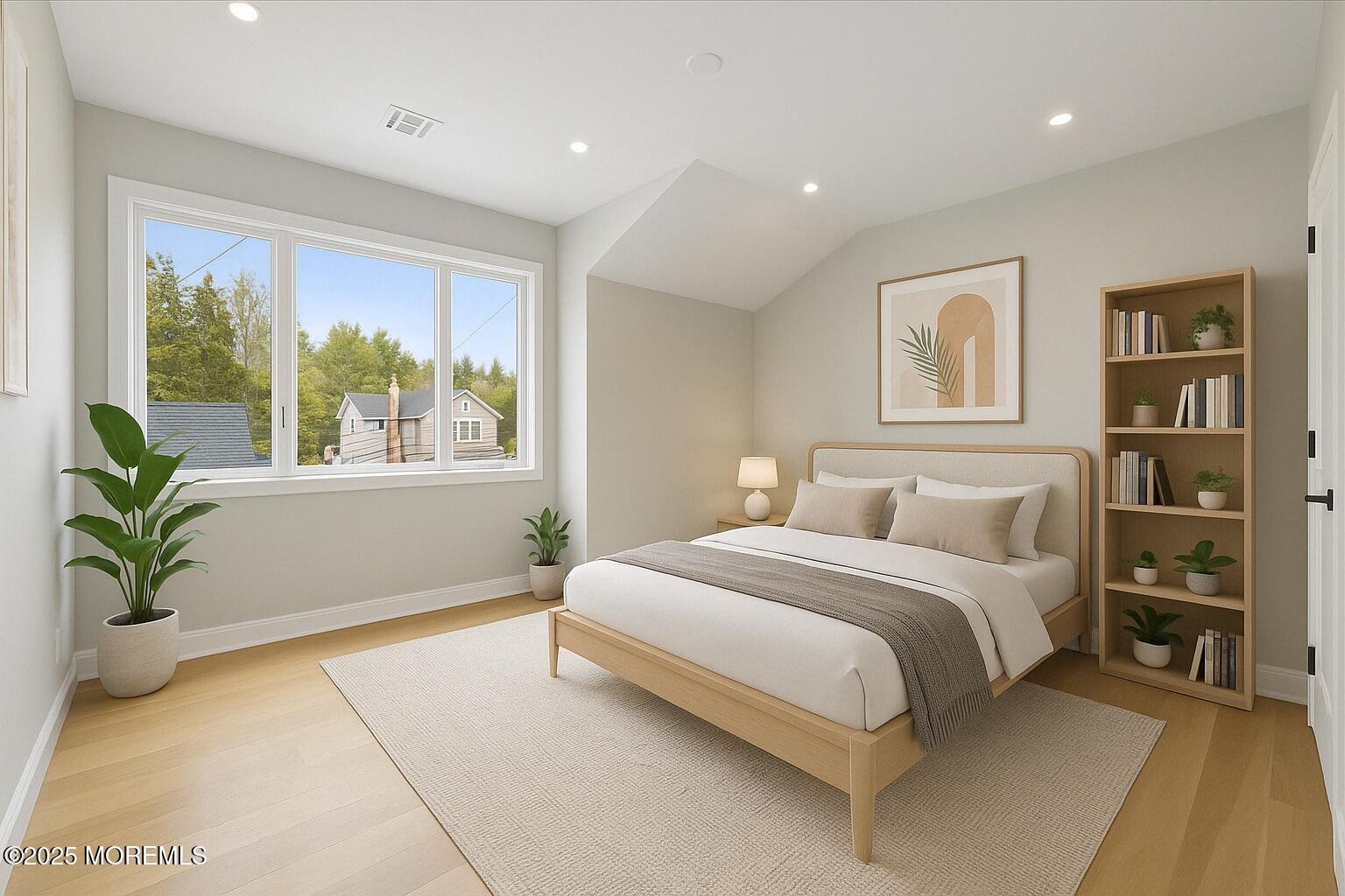 806 Arbor Road Paramus, NJ 07652 - Photo 18 of 29 a spacious bedroom with a large bed and a potted plant