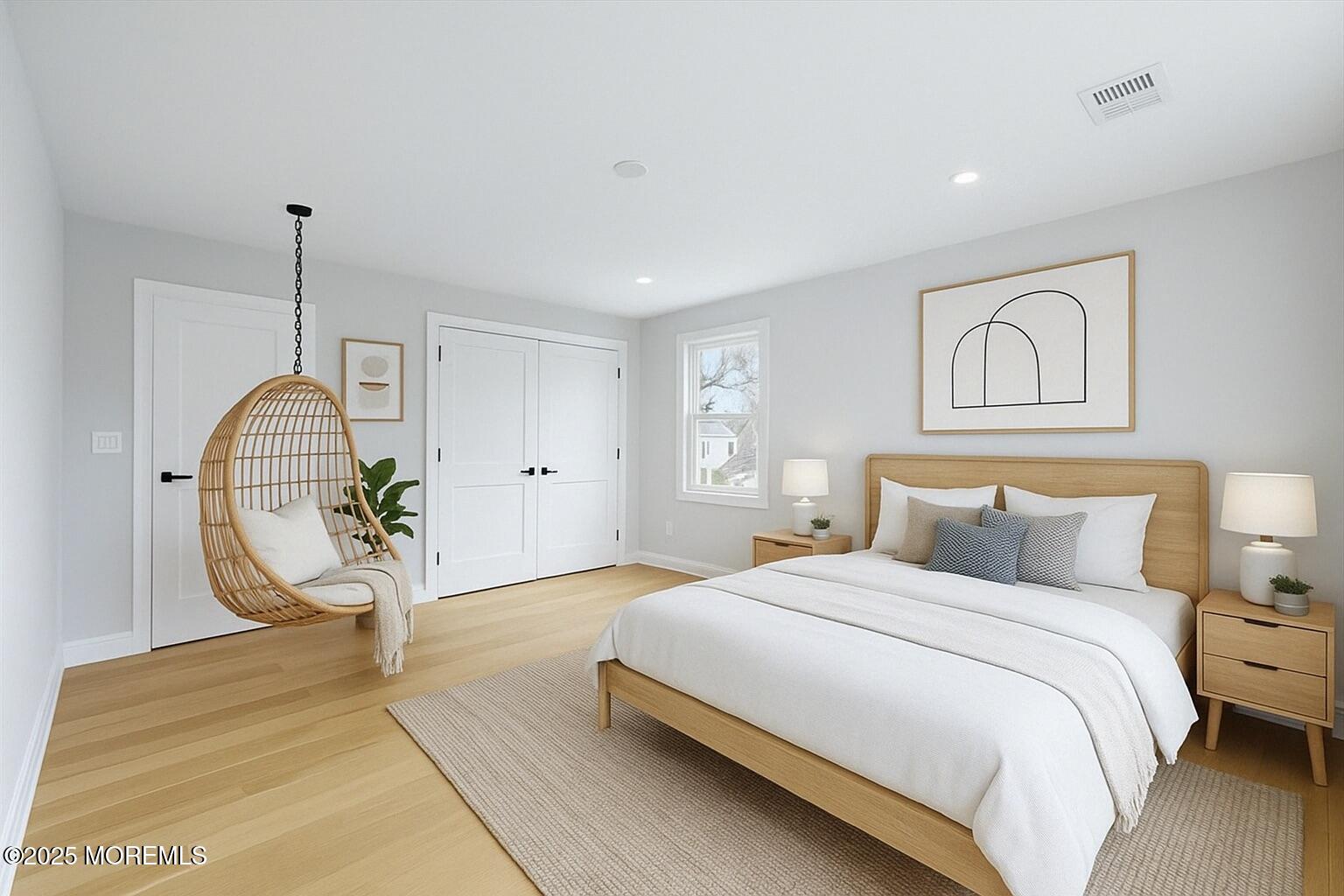 806 Arbor Road Paramus, NJ 07652 - Photo 19 of 29 a bedroom with bed and a chandelier