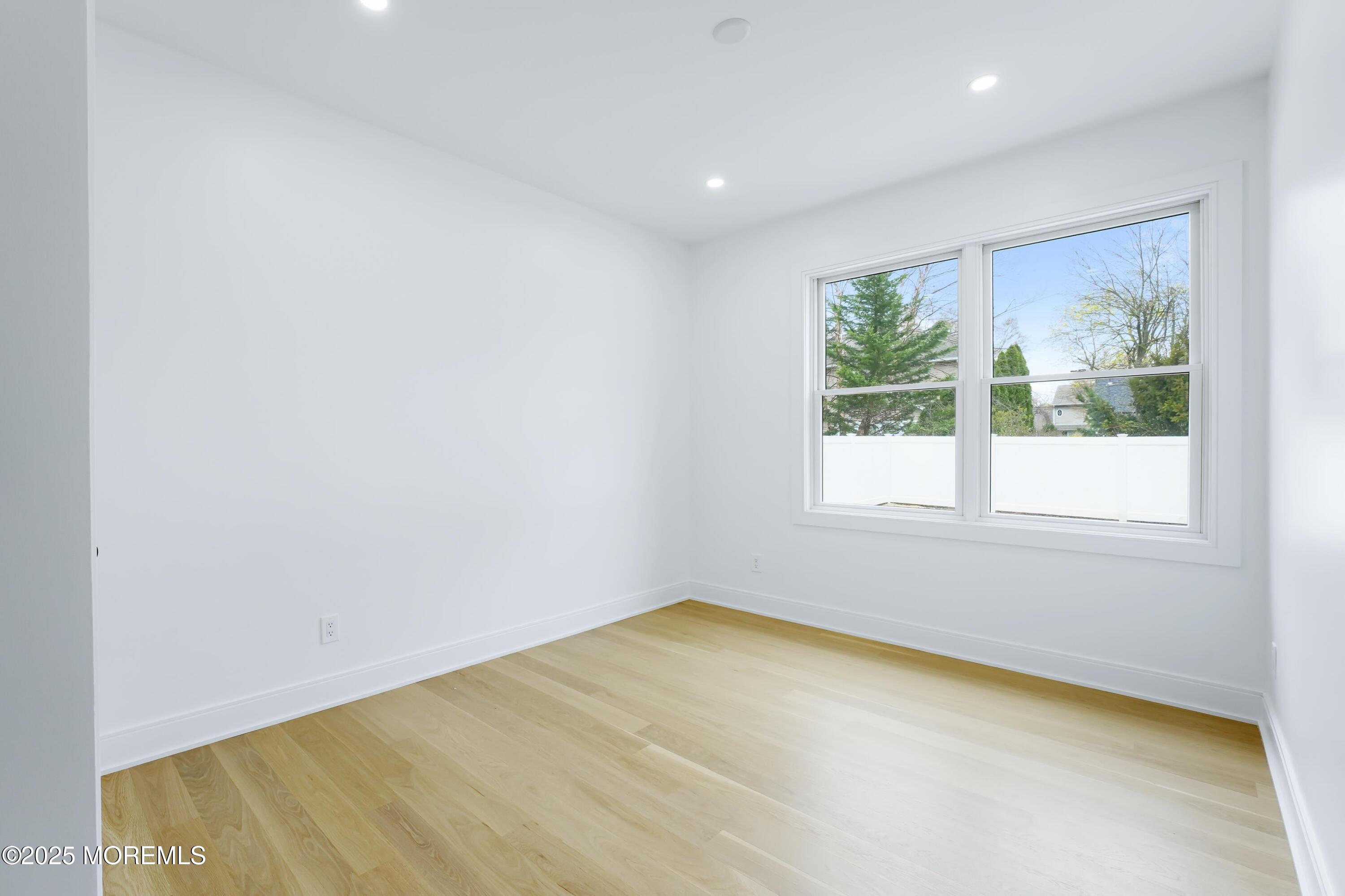 806 Arbor Road Paramus, NJ 07652 - Photo 24 of 29 an empty room with a window