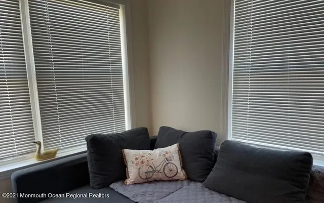 a view of a couch in a city