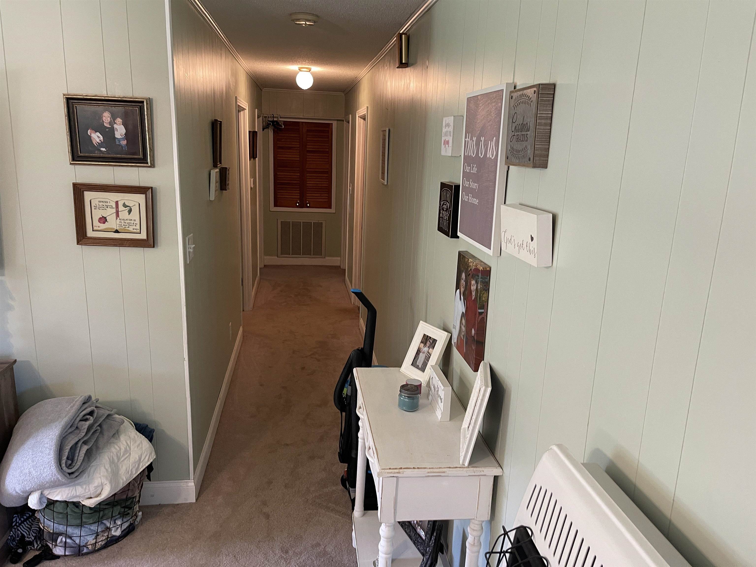 81 Puron Road Adamsville, TN 38310 - Photo 14 of 40 a room with furniture and a lamp