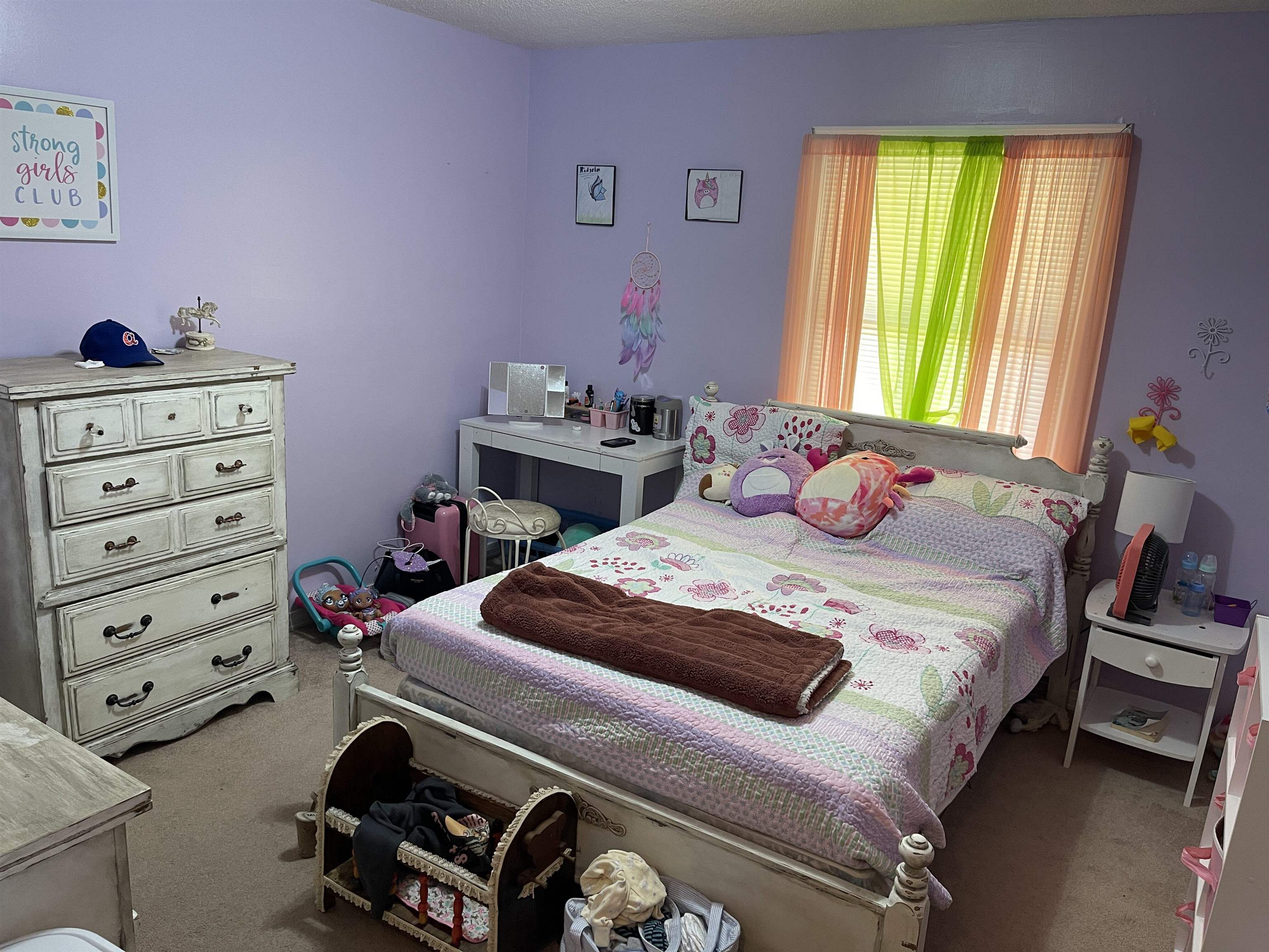 81 Puron Road Adamsville, TN 38310 - Photo 15 of 40 a bedroom with a bed and a window