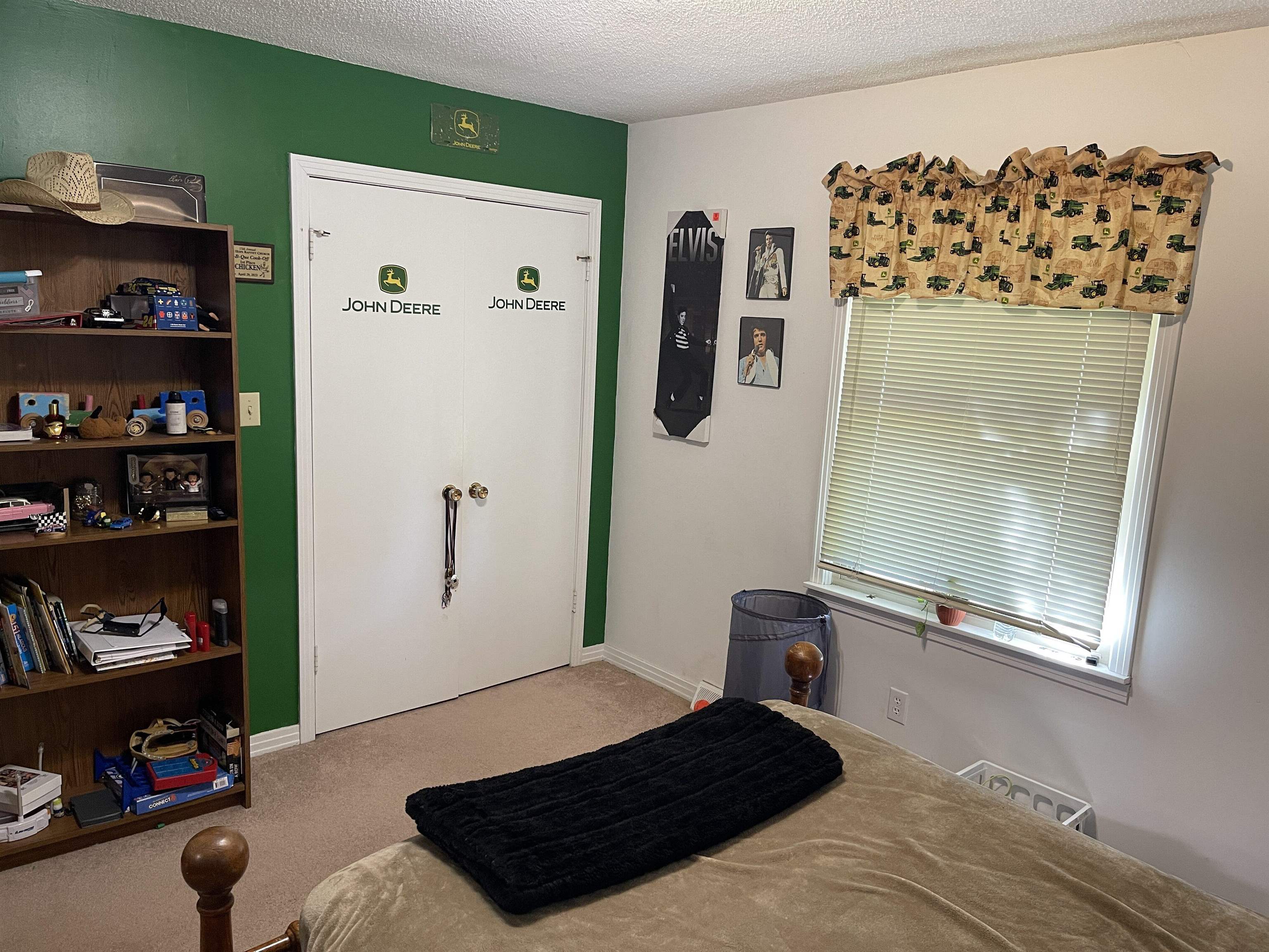 81 Puron Road Adamsville, TN 38310 - Photo 19 of 40 a bedroom with a bed and a window