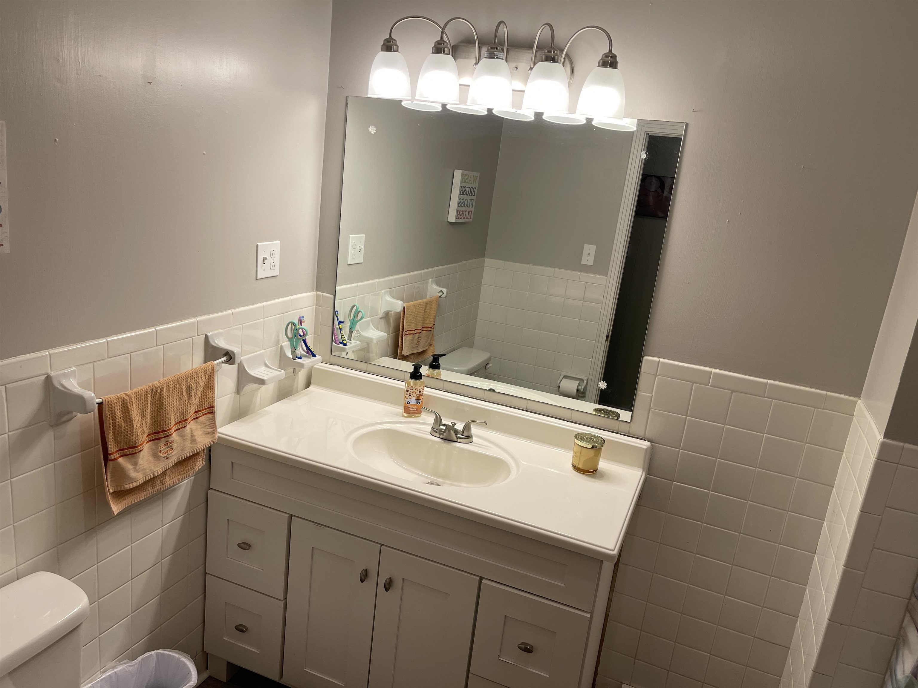 81 Puron Road Adamsville, TN 38310 - Photo 24 of 40 a bathroom with a sink and a mirror